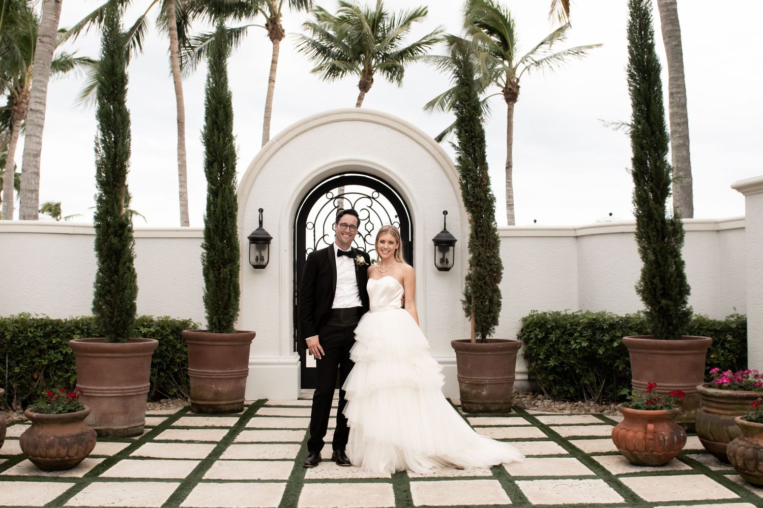 bride and groom portrait beautiful landscaping and architecture