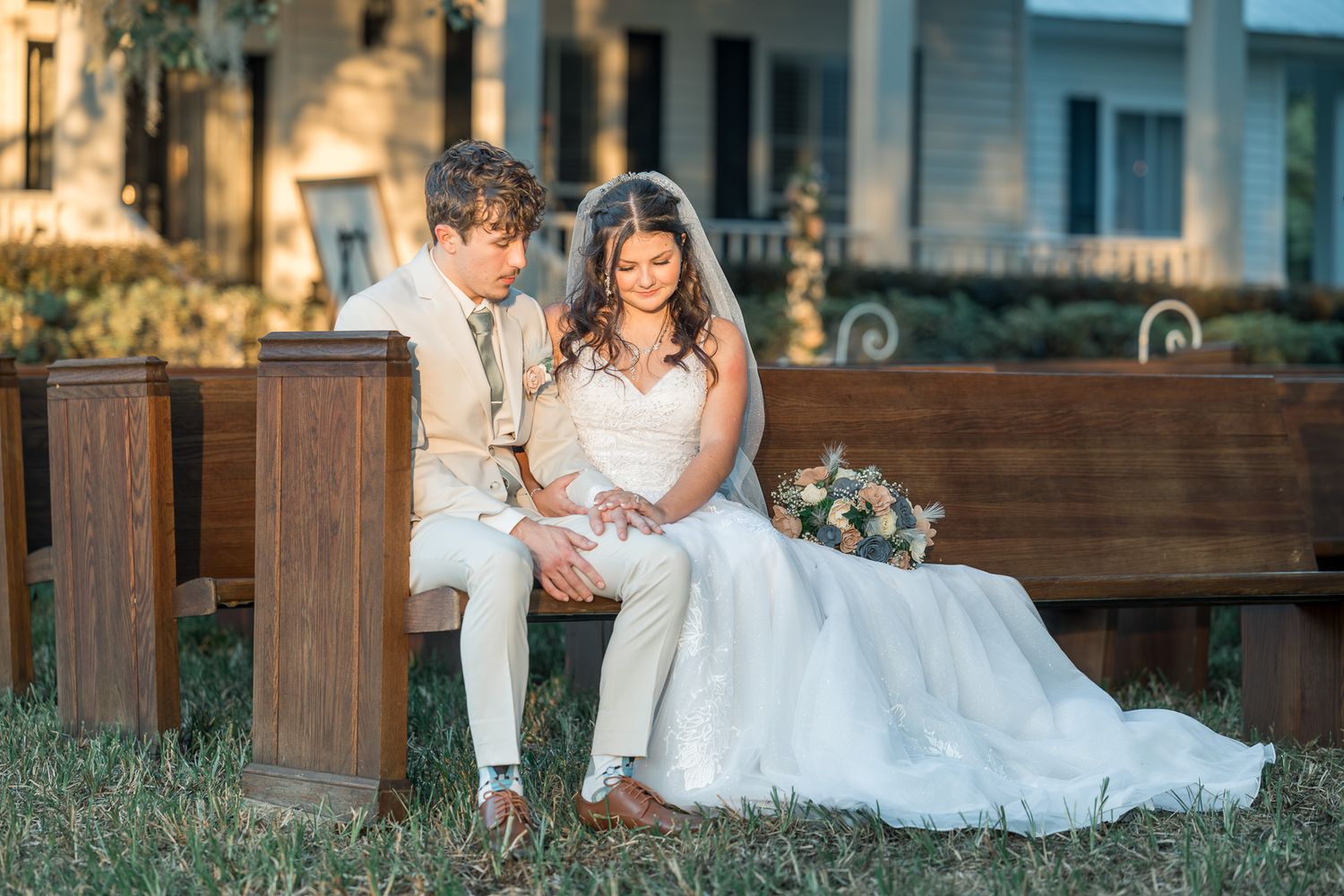 Candid wedding moments captured on a rustic wooden porch during golden hour.