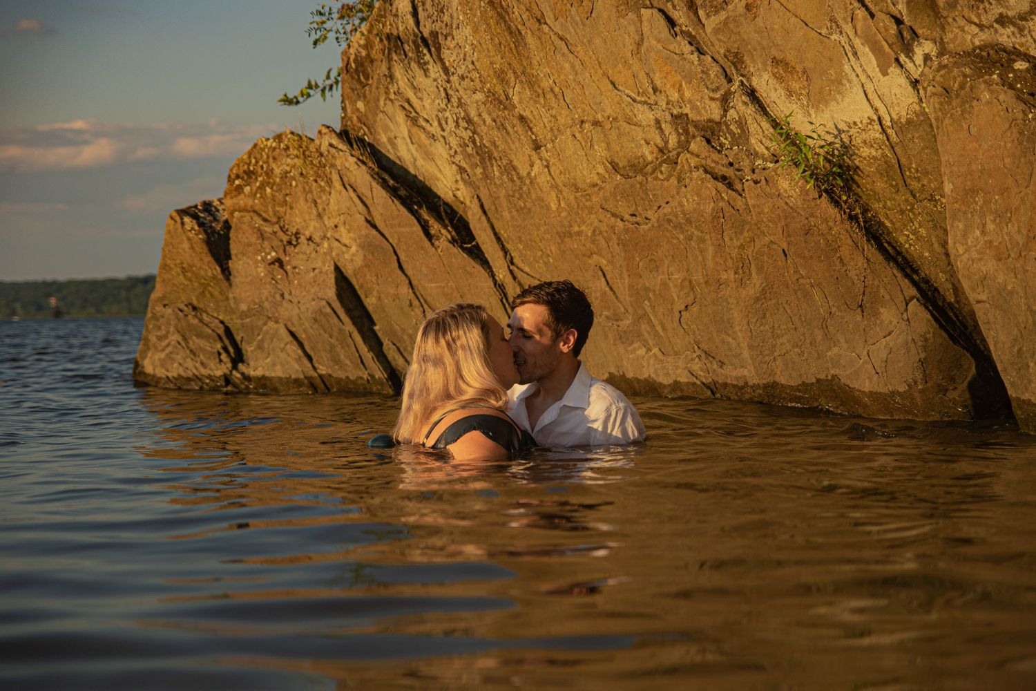 Romantic sunset photos by rocky waterfront.