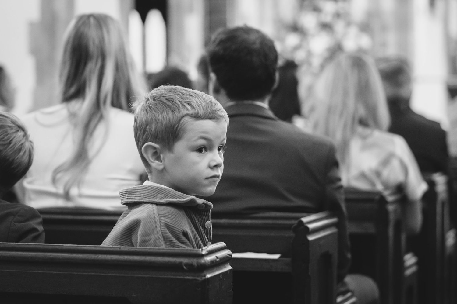 Boy waiting for the bride in the church