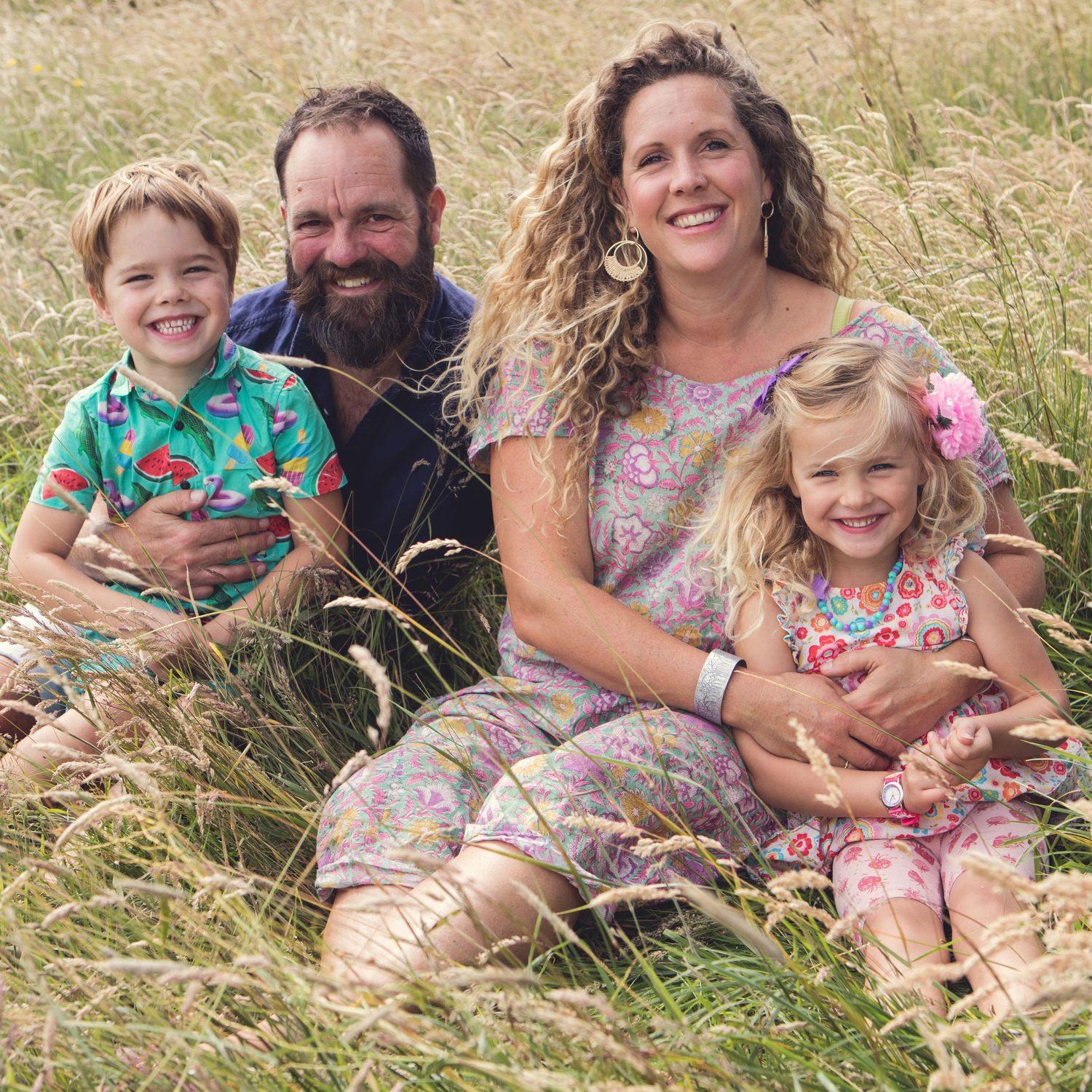 Family photoshoot lockdown in long grass with children and a dog, Derbyshire, UK