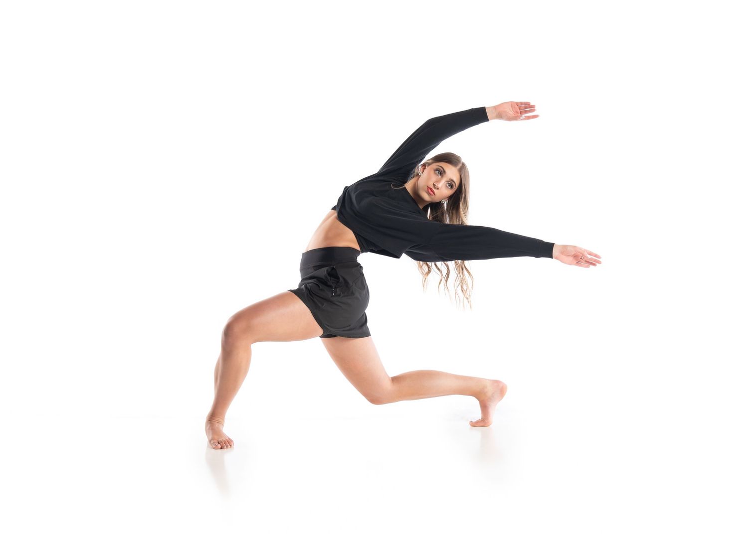 Senior Dancer performing a contemporary lunge