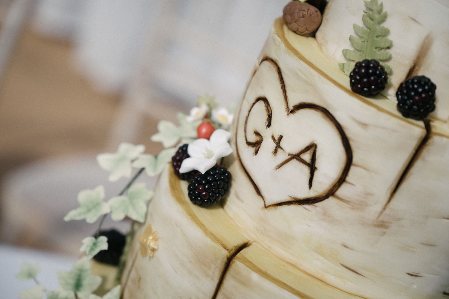 individual and unique wedding cake featuring bride and groom initials