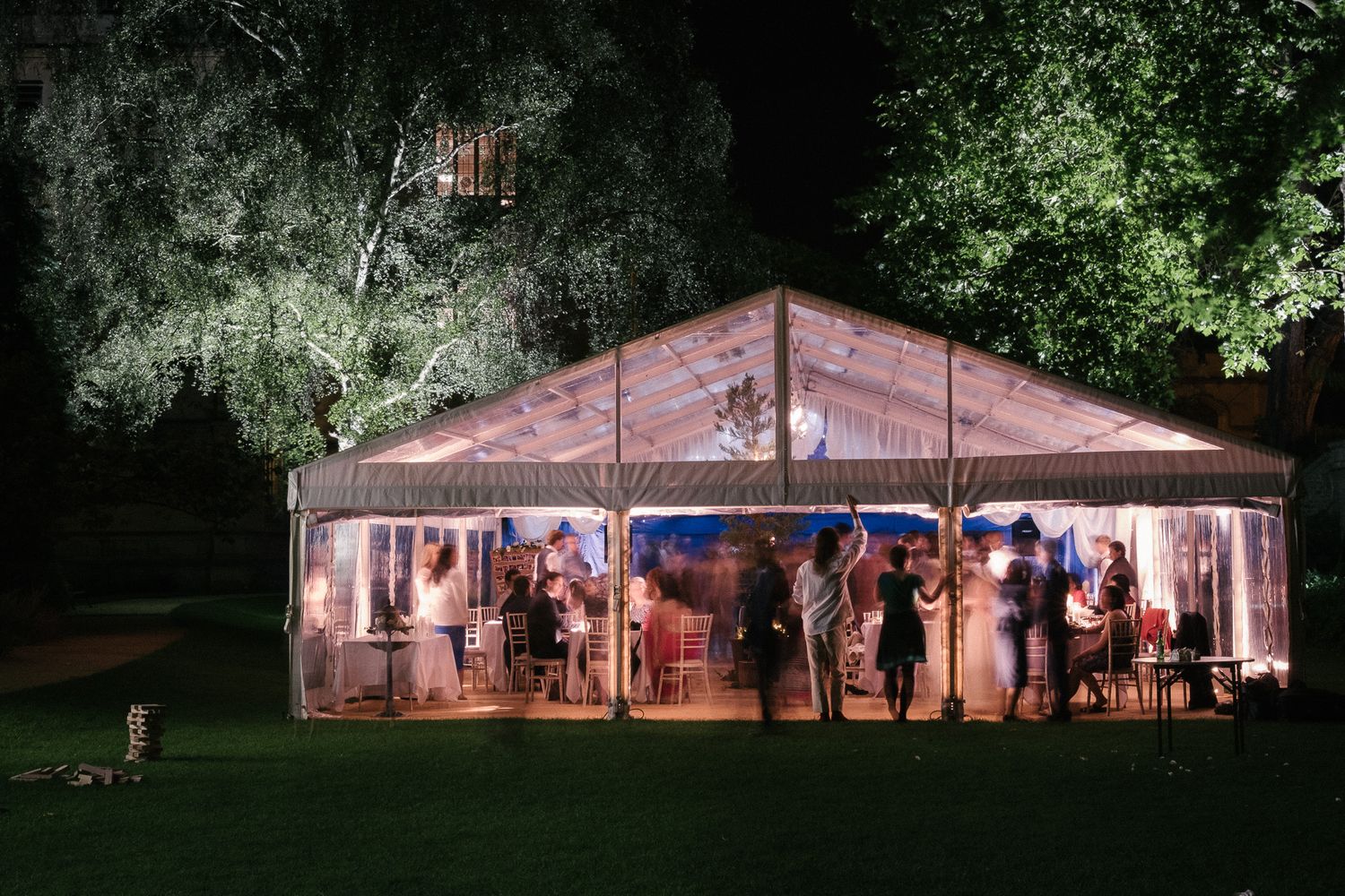 wedding party ceilidh in marquee set in Oxford university grounds of Exeter college