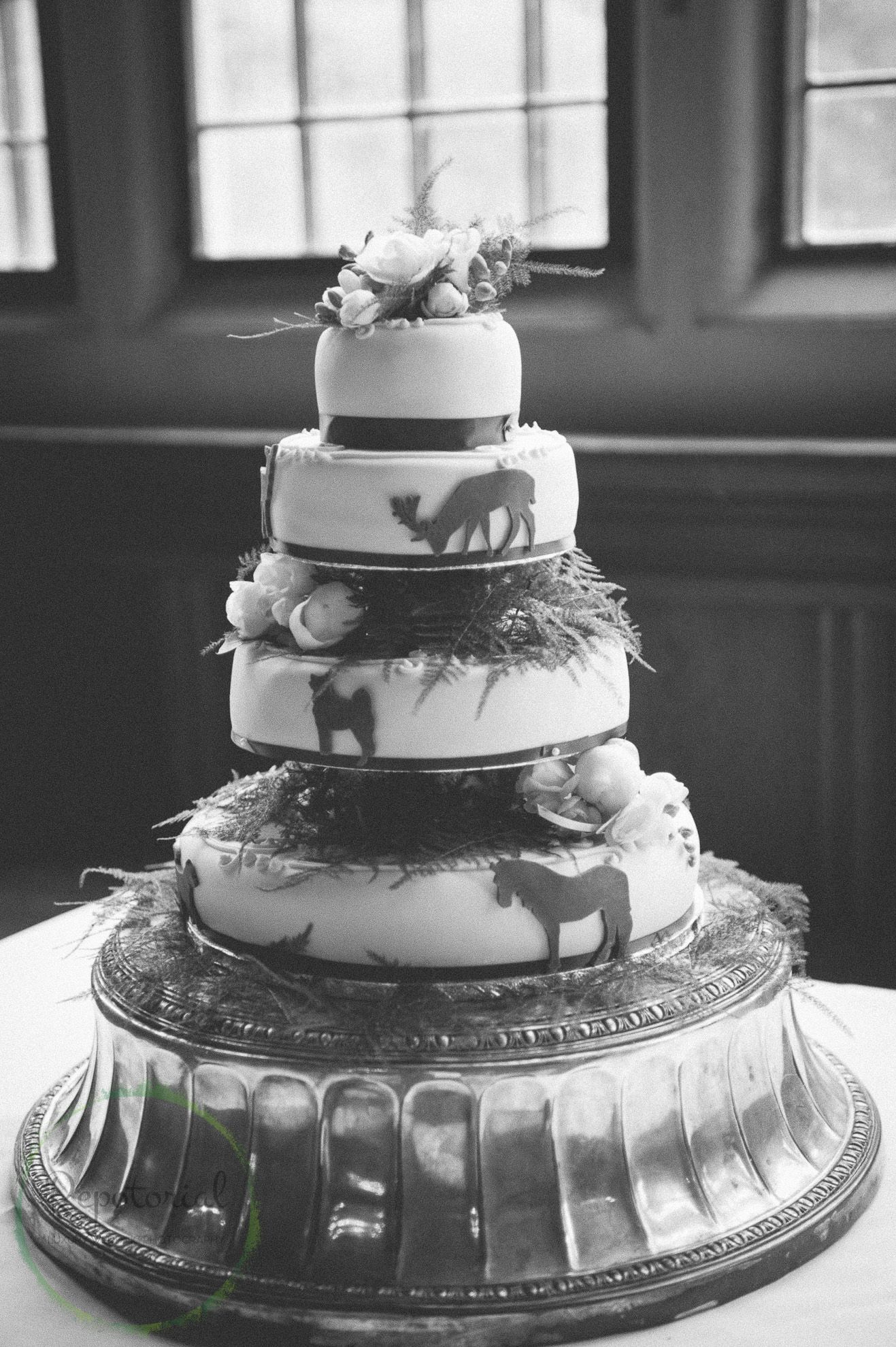 iced and decorated multi tiered wedding cake