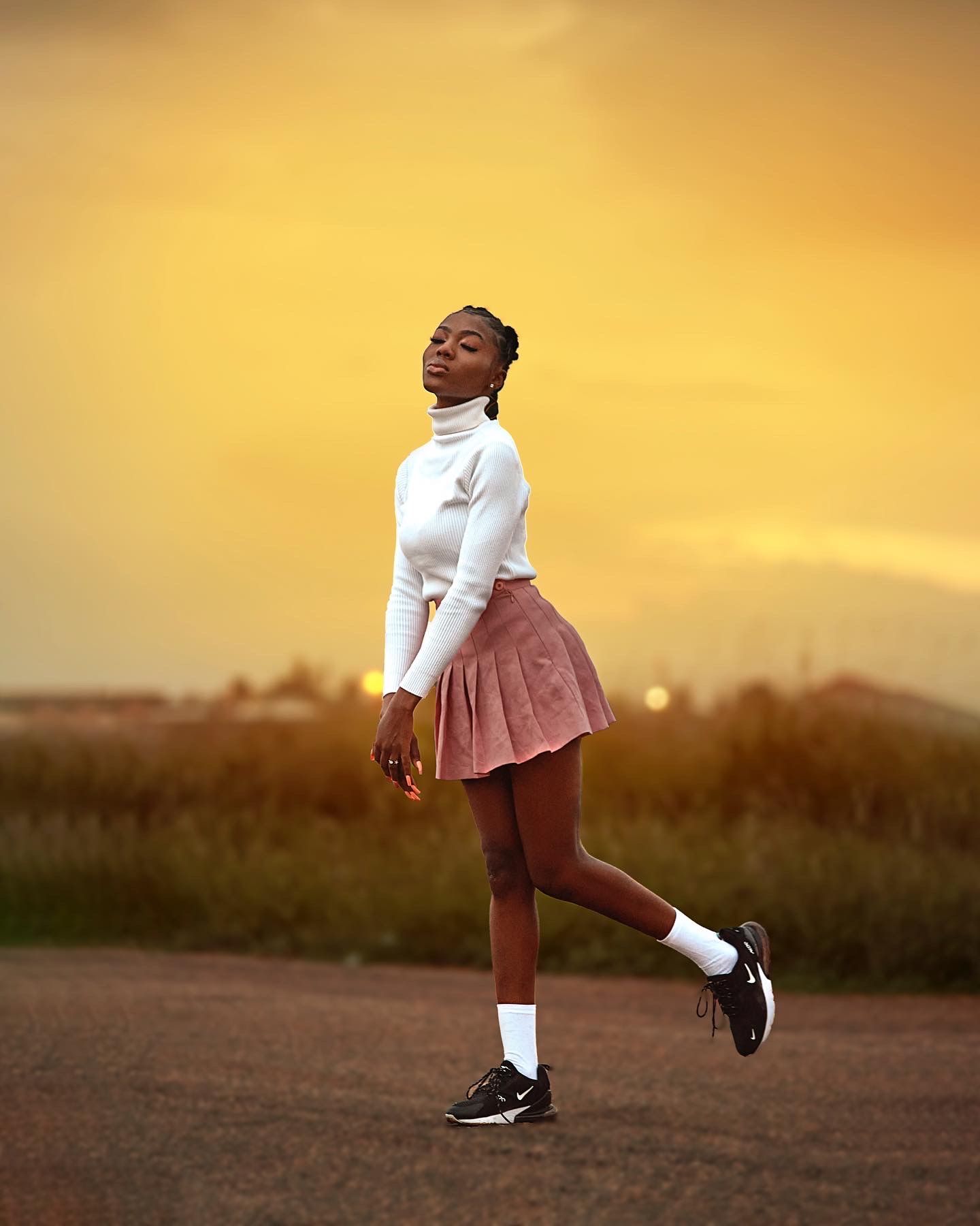 Dynamic outdoor photos at sunset showing movement in white and brown clothing.