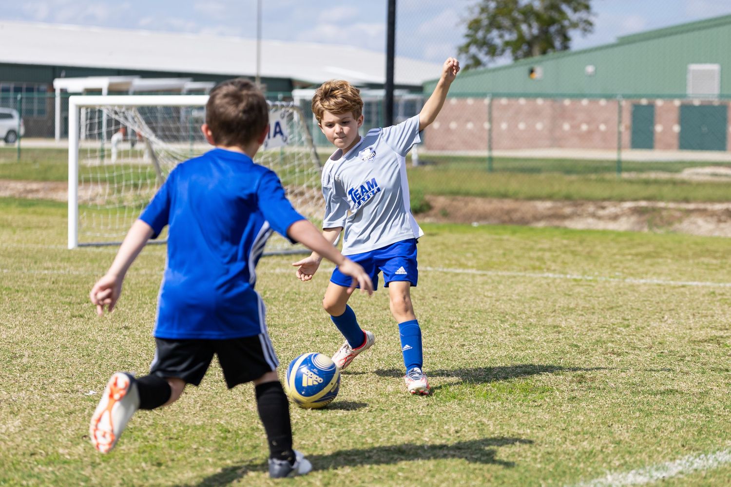 Soccer player kicking a ball