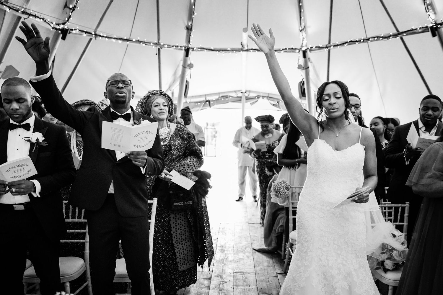 Bride and groom singing at the vines in Rochester