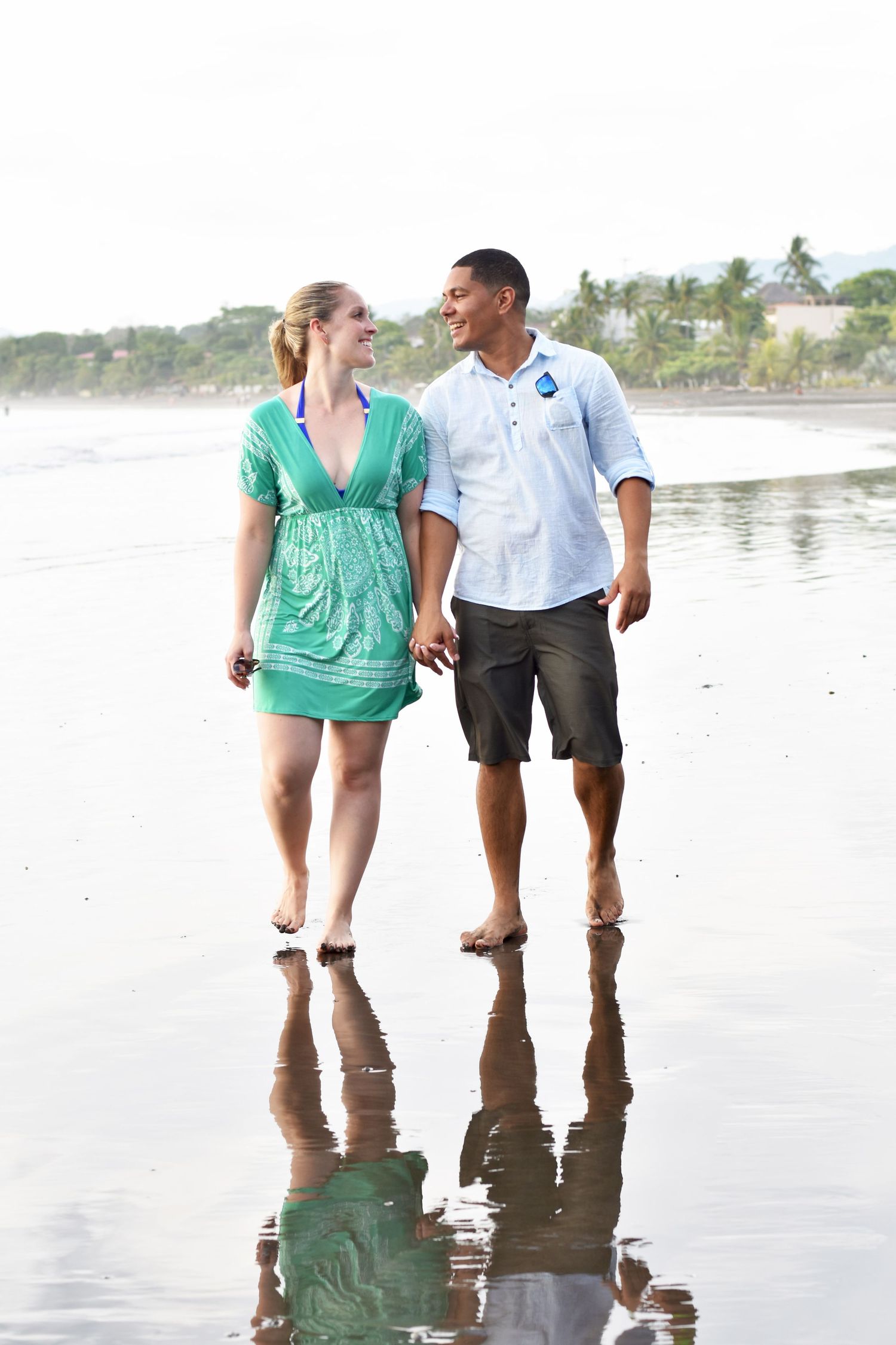 Couple walking on a beach in Costa Rica