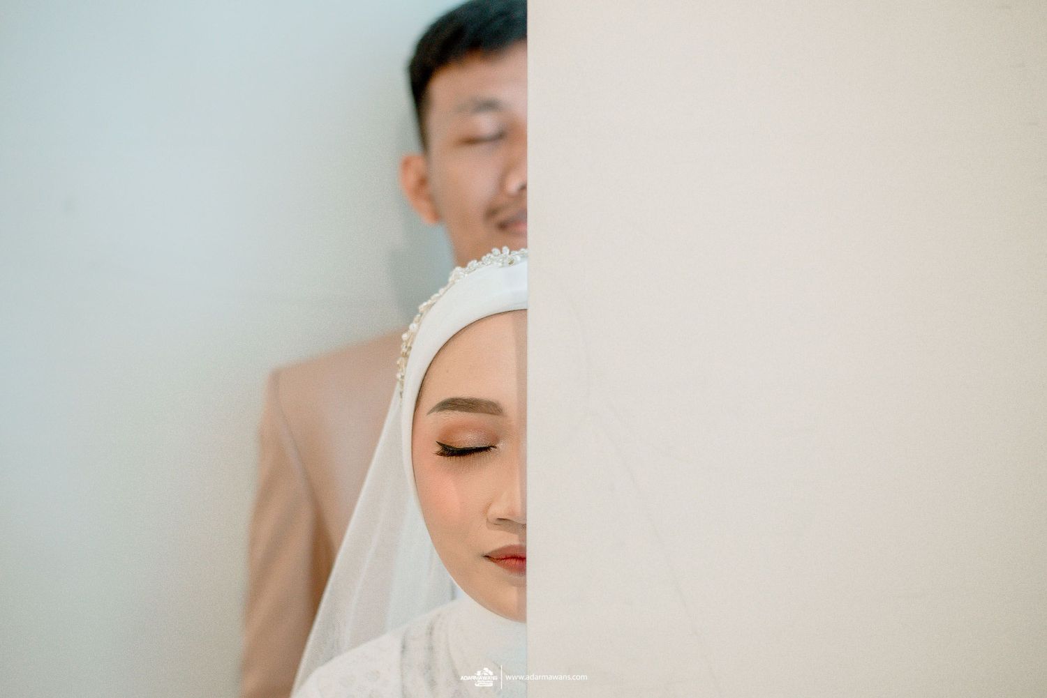 Artistic split-frame portrait showing partial faces against minimalist white background.