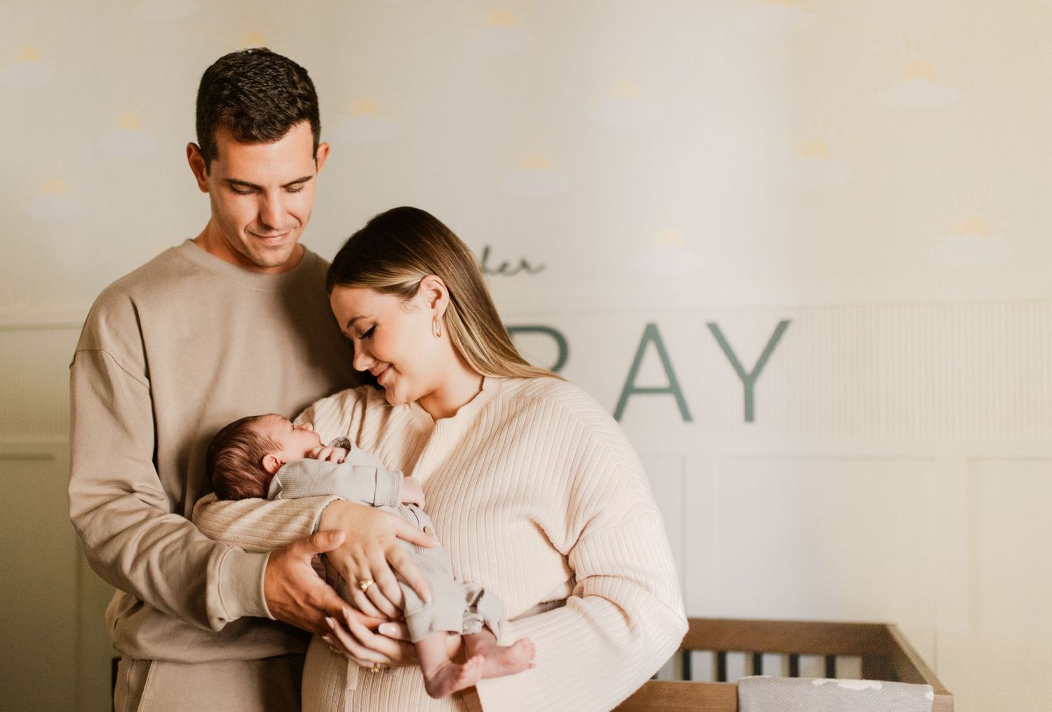 Candid lifestyle photos showing tender moments in neutral tones against a light background.