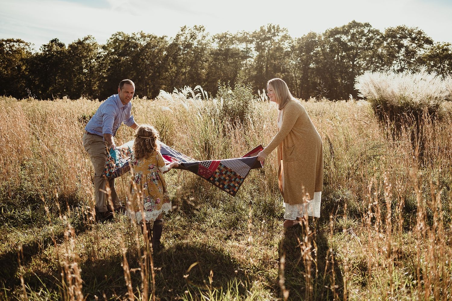 A playful scene of swinging in a sunlit meadow during golden hour.