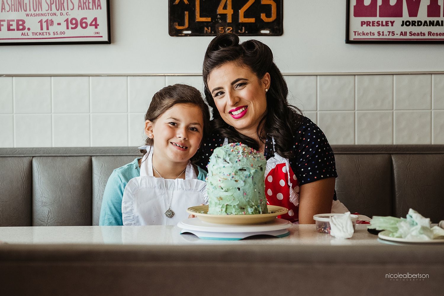 Retro diner scene with mint green cake and vintage decor.