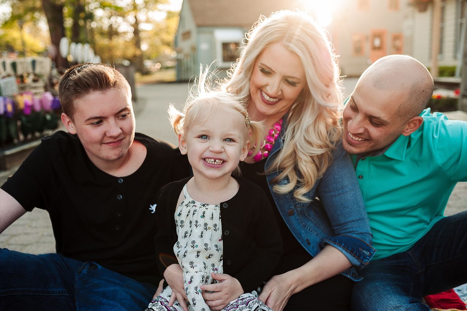 Happy family enjoying outdoor time together at sunset.