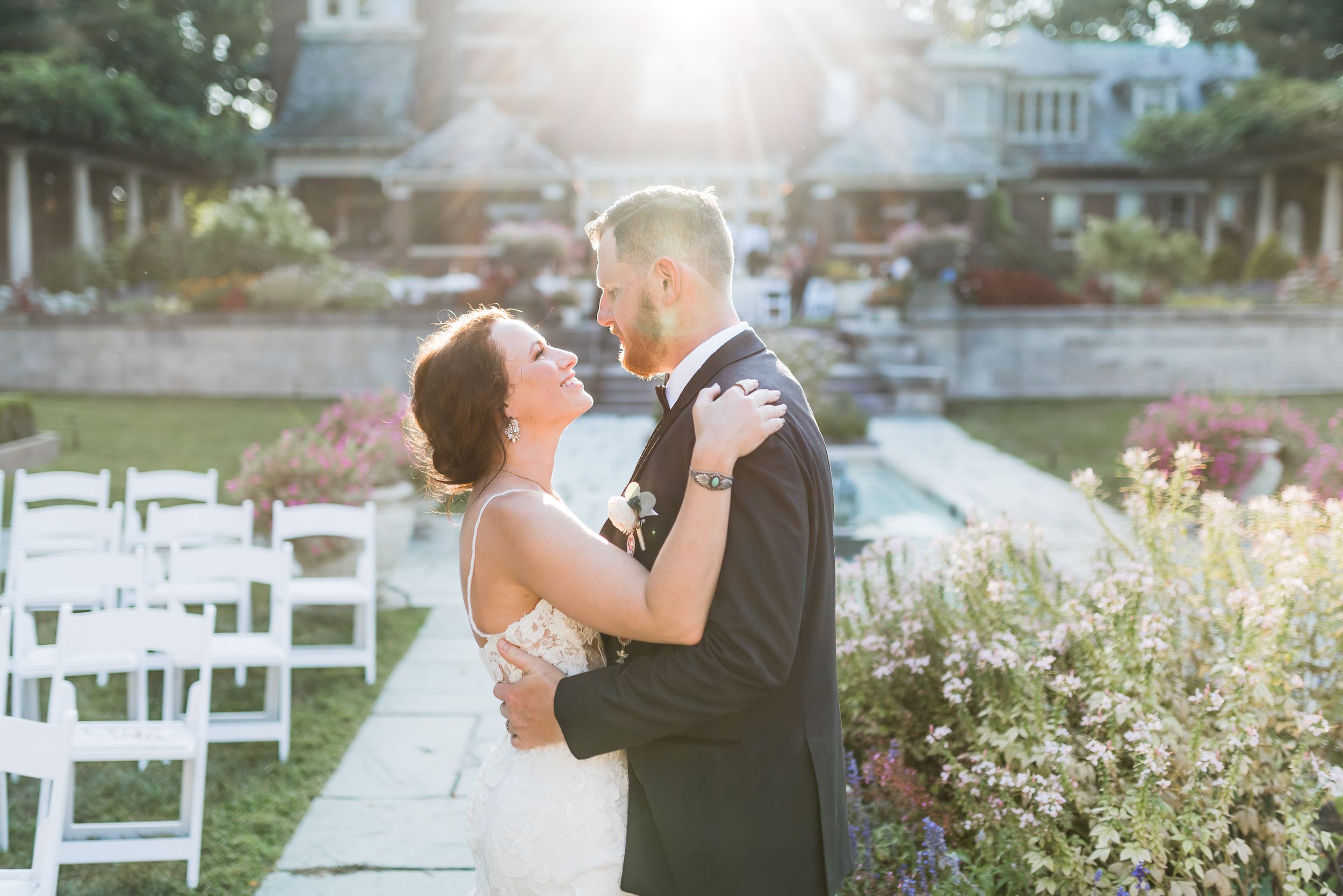 Bright and airy sunny wedding couple at the Inn at Irwin Gardens downtown Columbus classic old money romantic aesthetic.