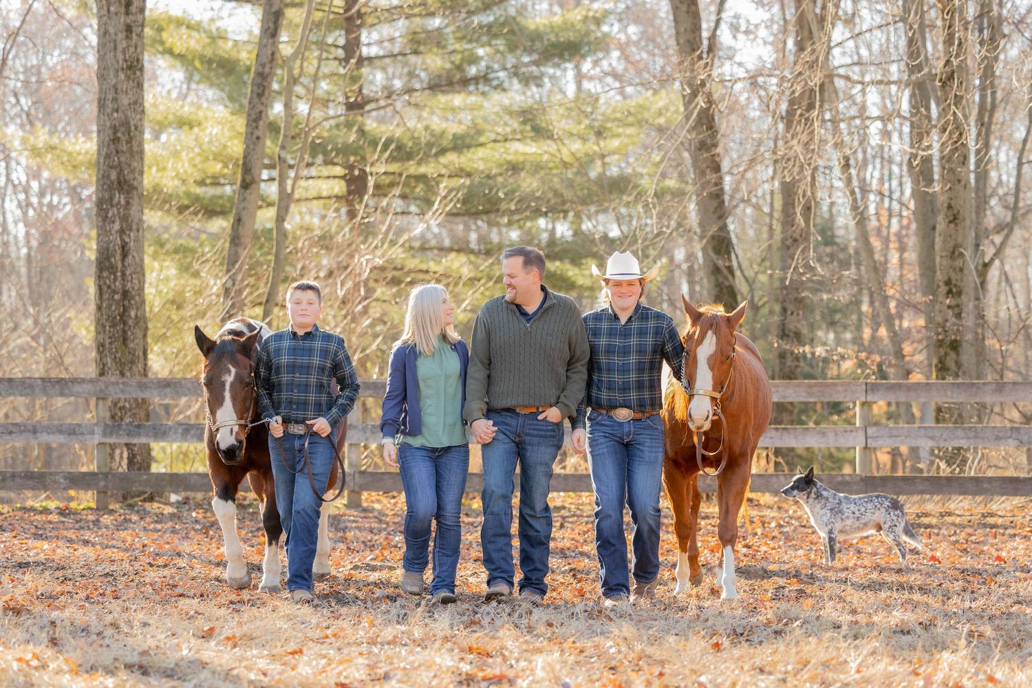 large family with two horses