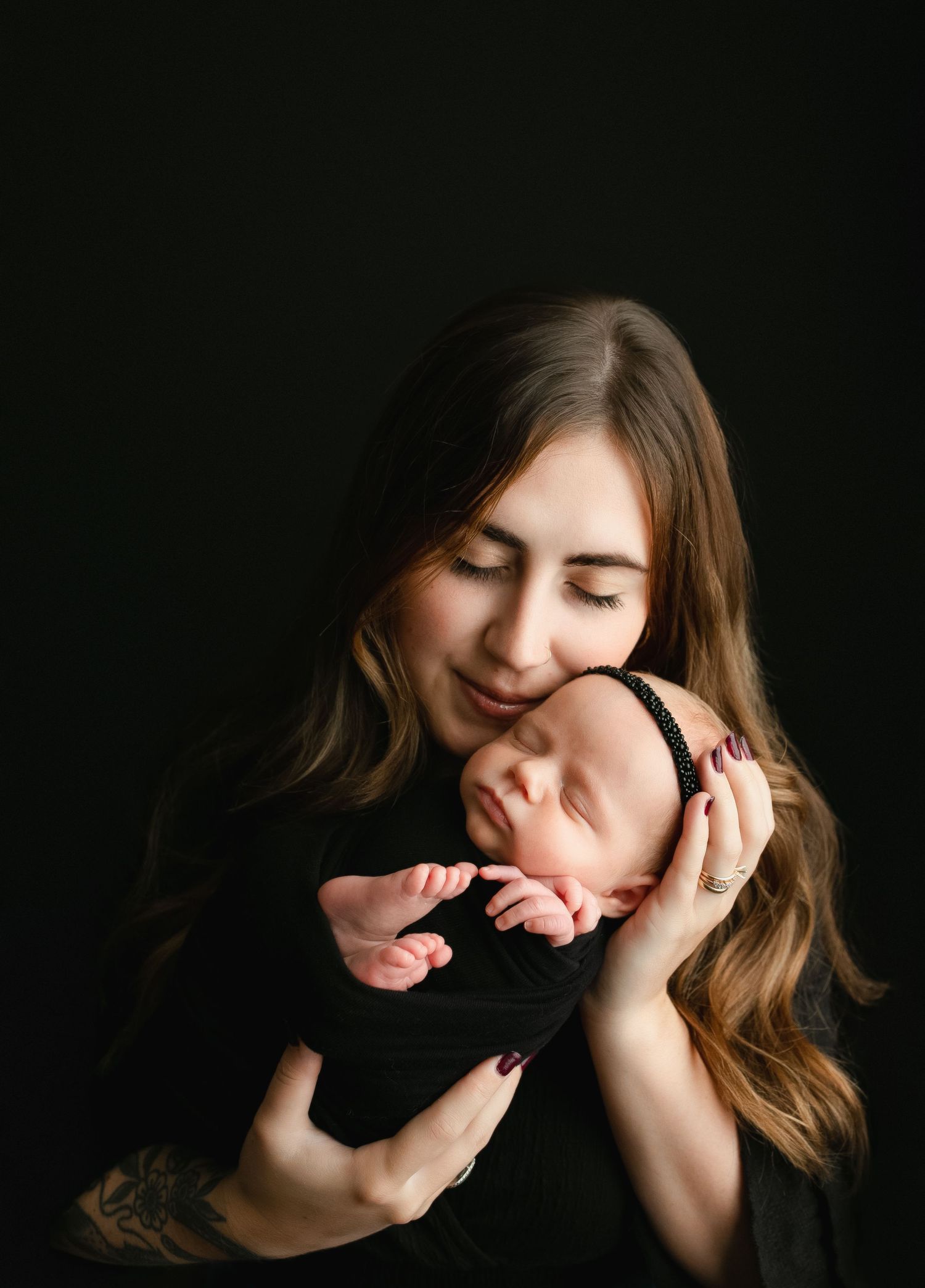 An up-close shot of Mom smelling her newborn girl. Greenville, SC newborn photographer; Easle SC newborn photographer, Upstate newborn photo