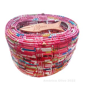 Pink and multicolored beaded basket with fish design crafted with intricate beadwork.