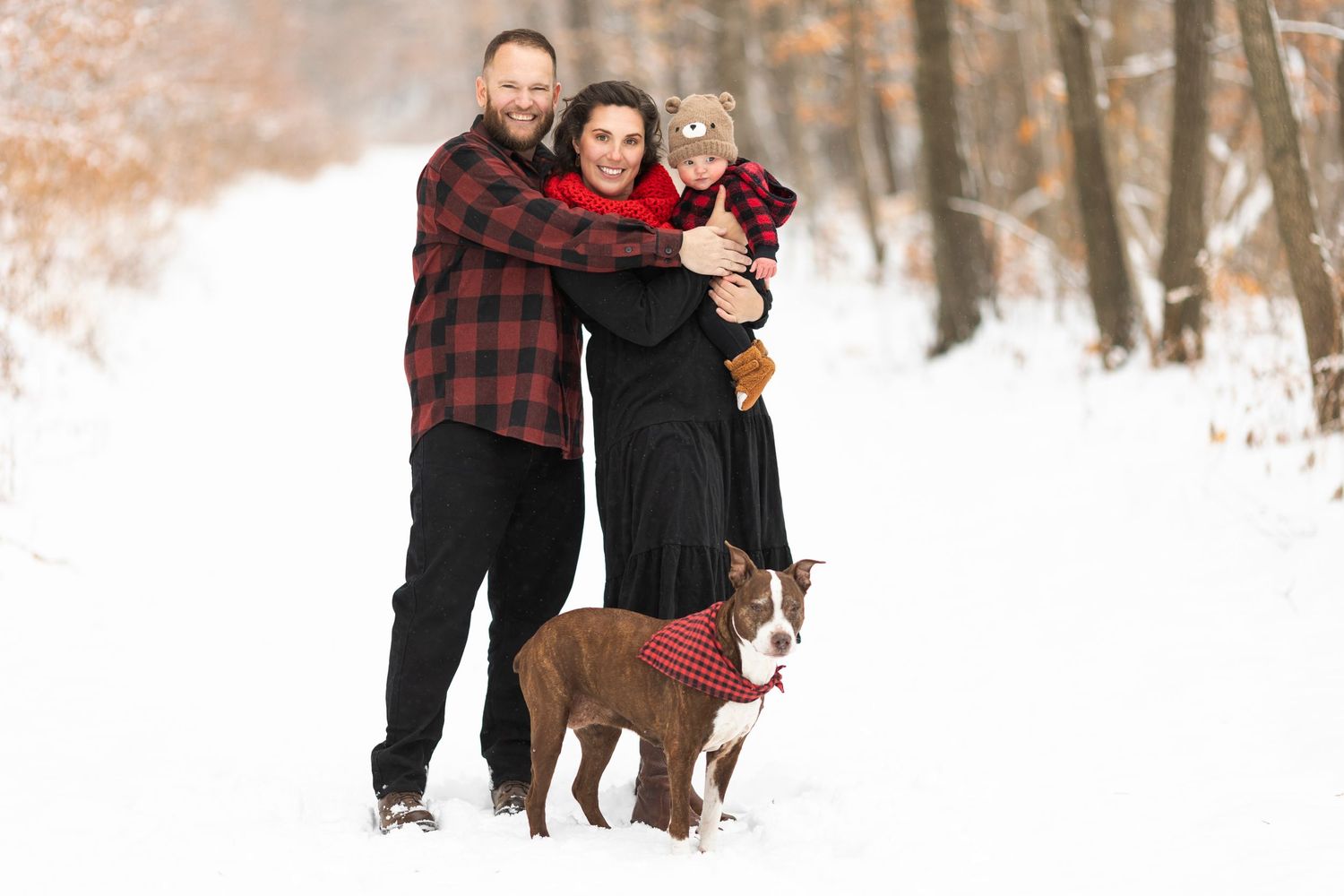 family winter snow photoshoot southern Minnesota winter pit bull snowfall baby