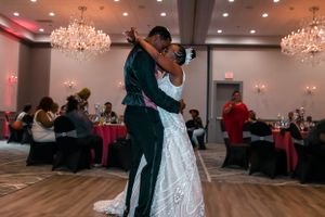Bride and groom embracing during first dance