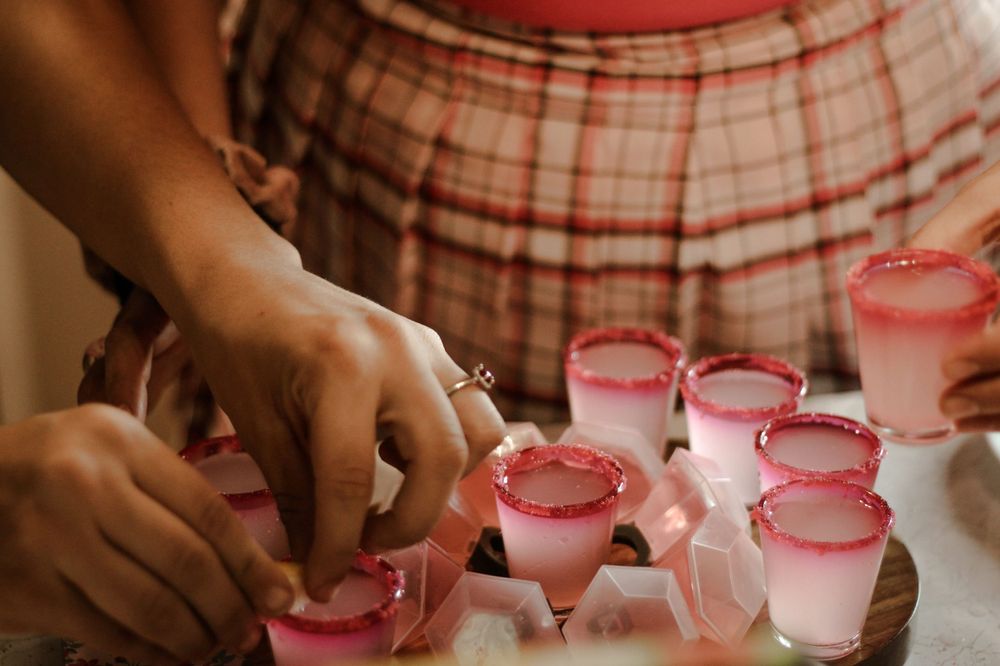 A tray of shots in pink for a bachelorette party