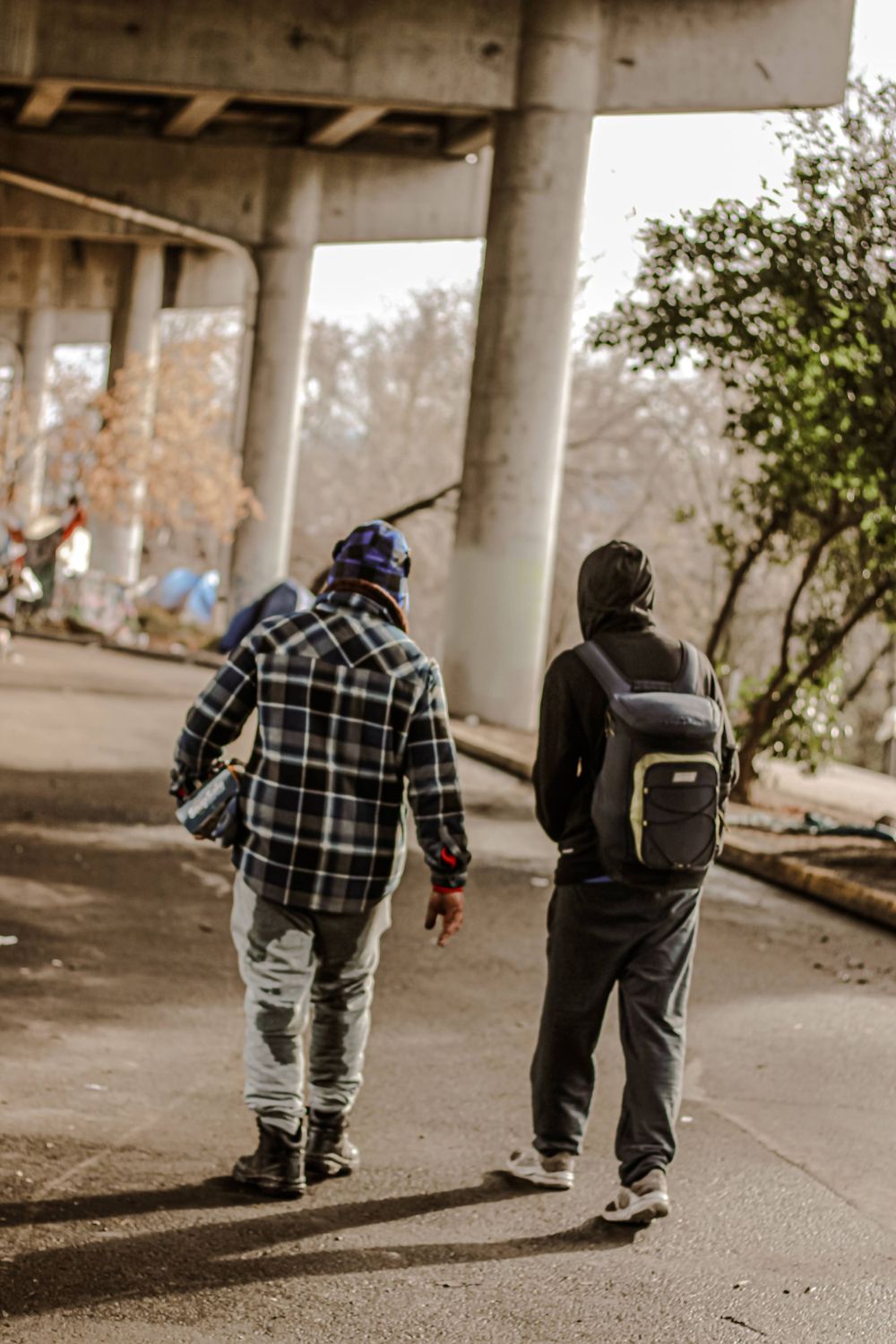 A few event goers walk away after connecting with resources in Medford, OR