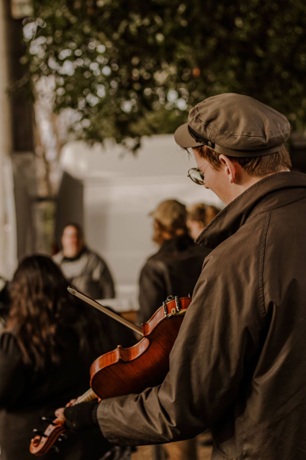 A violinist performs at a community event