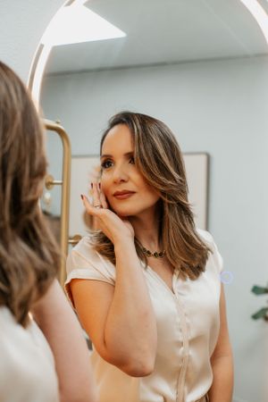 Close-up portrait shots in bright modern office setting with minimalist decor.