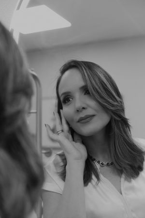 Artistic black and white close-up portraits showing dramatic angles and expressions.