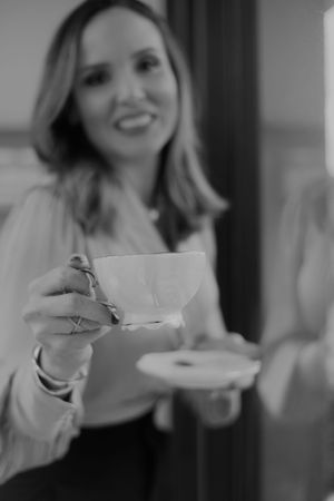 Black and white photography series capturing artistic tea drinking moments.