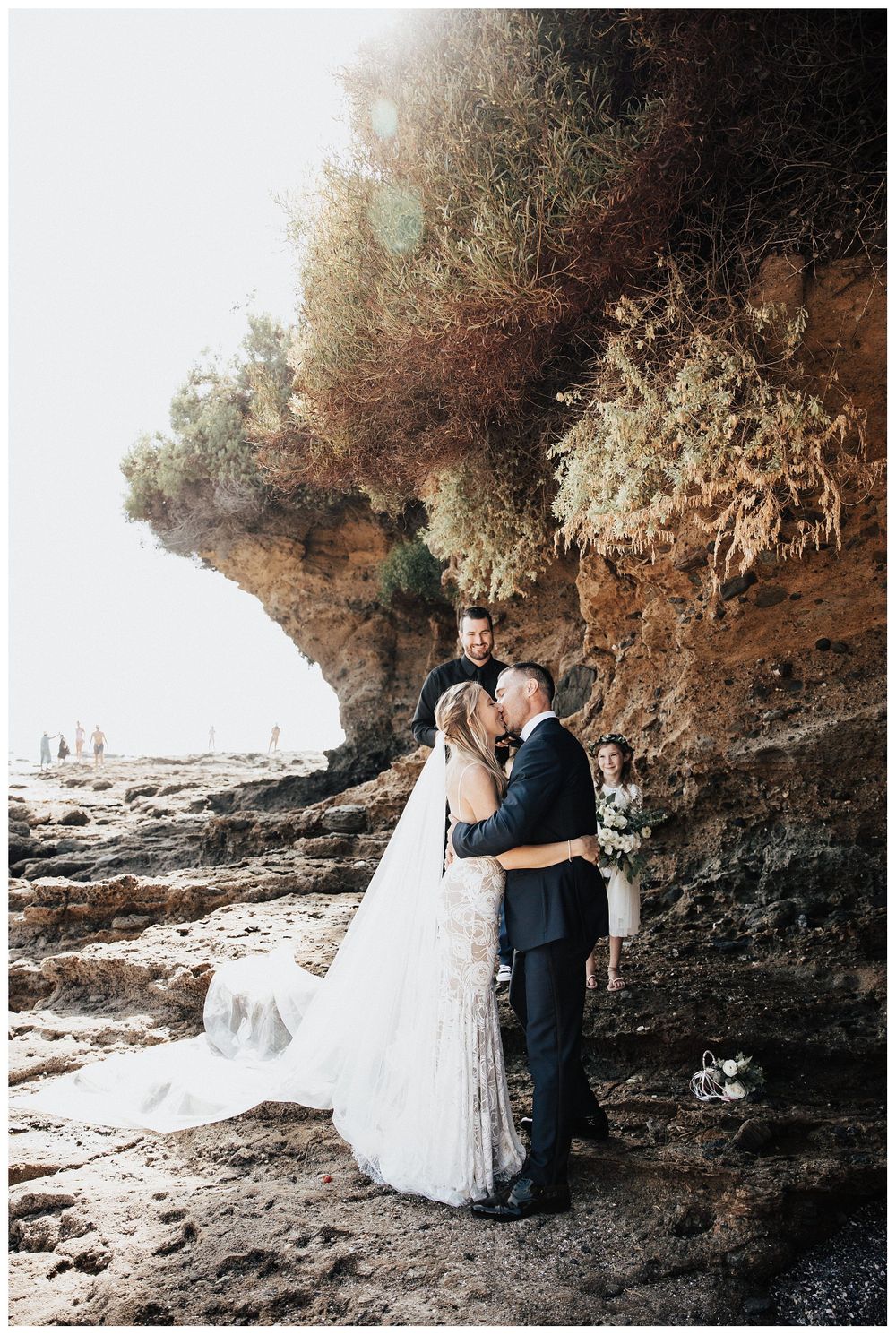 bride and groom first kiss, beach wedding ceremony, beach wedding inspiration