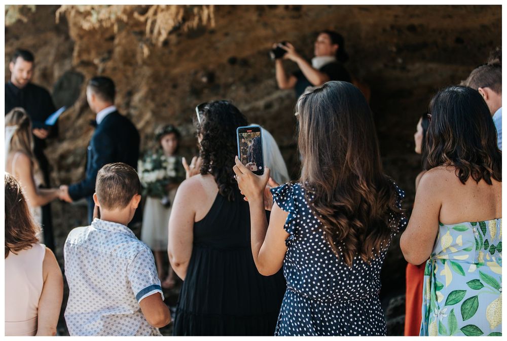 wedding guests, wedding guests taking photos