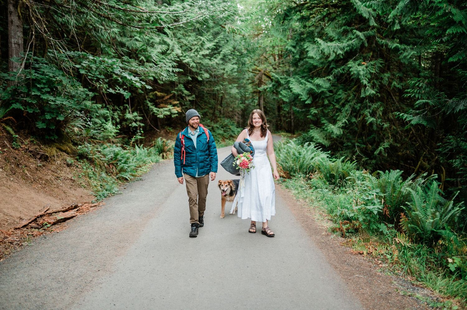 couple leisurely walking on their elopement day. Photo by Washington elopement photographer, Tori.