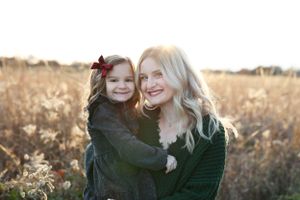 Sisters in a field at sunset