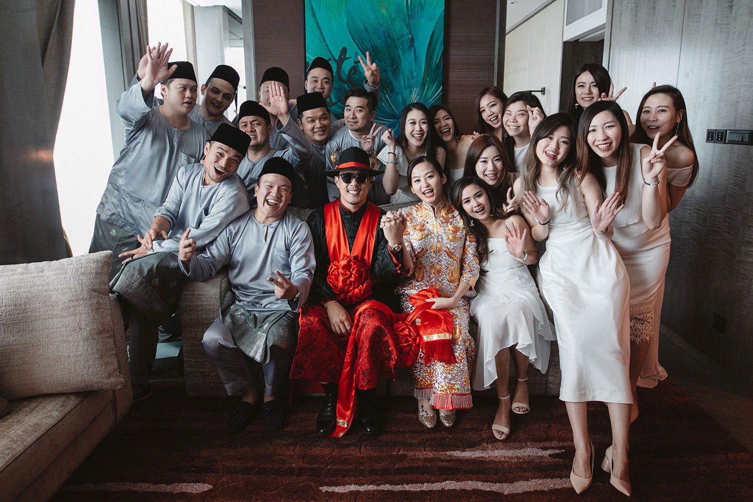 chinese wedding bridal party cheering for their group photo
