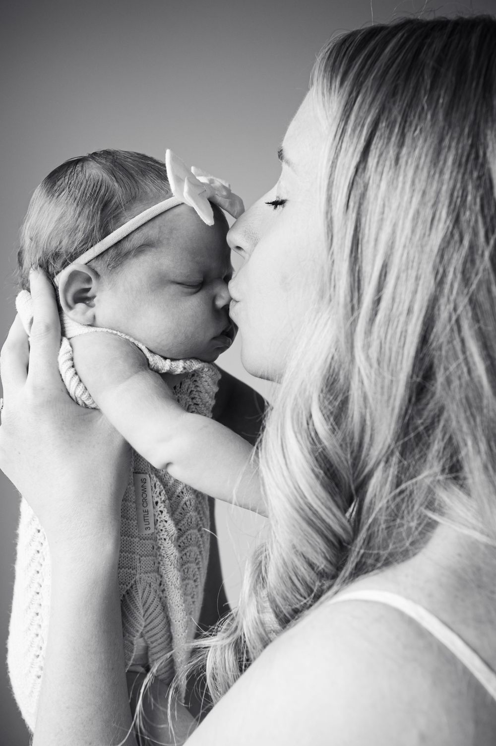 Black and white portrait of intimate moment with sleeping newborn.
Altona Family Photographer Melbourne