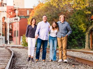 Family photo session on train tracks