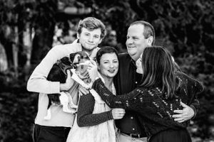 outdoor black and white family photography with dog