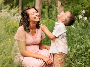 family maternity photography mother and son laughing