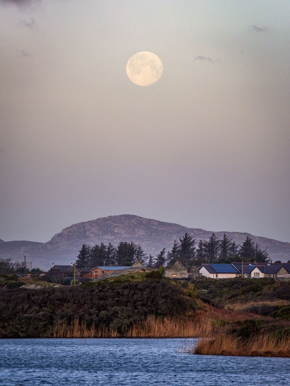 Moonset over Holyhead Mountain, Anglesey.