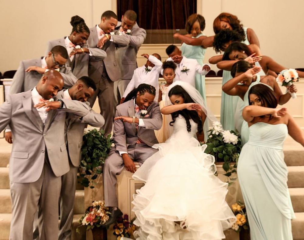 Energetic and spirited image showcasing the wedding party.