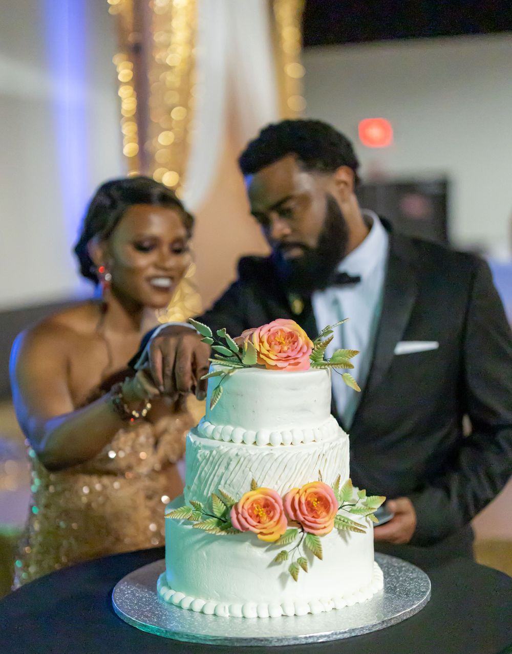 ride and groom share a delightful cake-cutting ceremony.