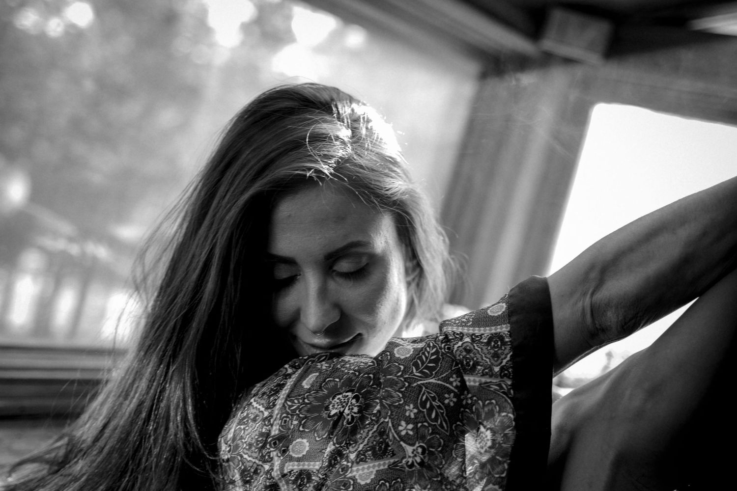 Black and white portrait capturing peaceful moment of rest.