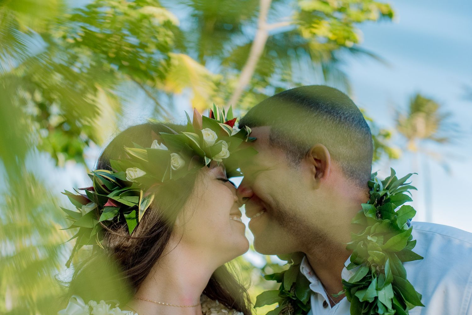 Bride in Haku going nose to nose with her groom