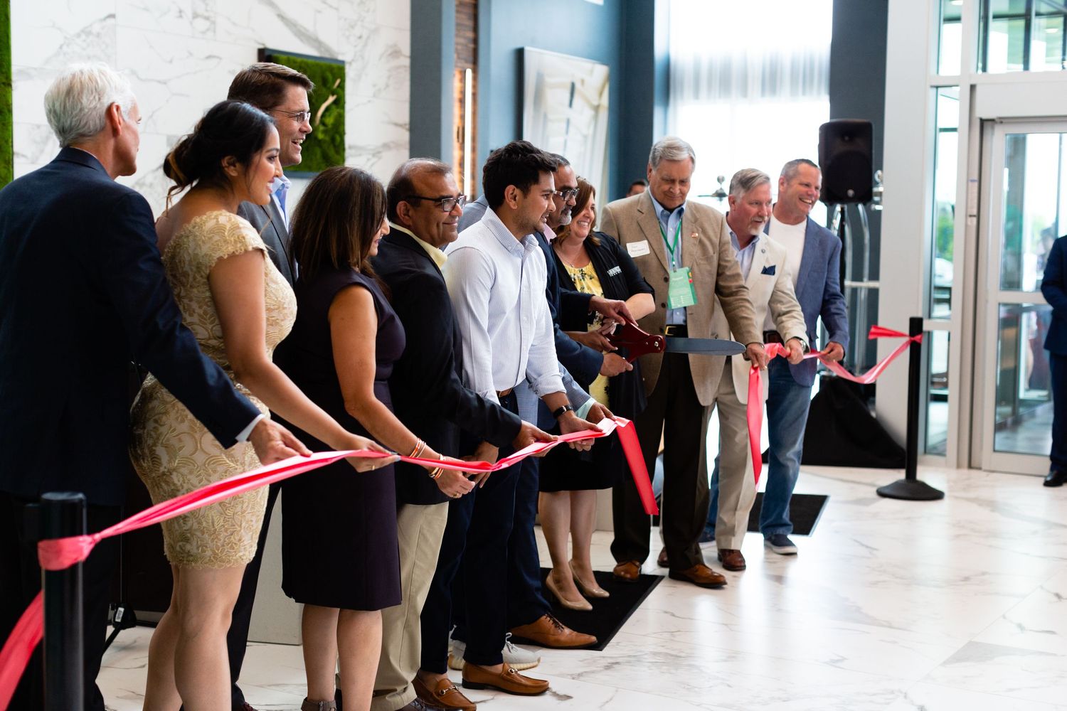 Grand opening for Embassy Suites in Plainfield with ribbon cutting