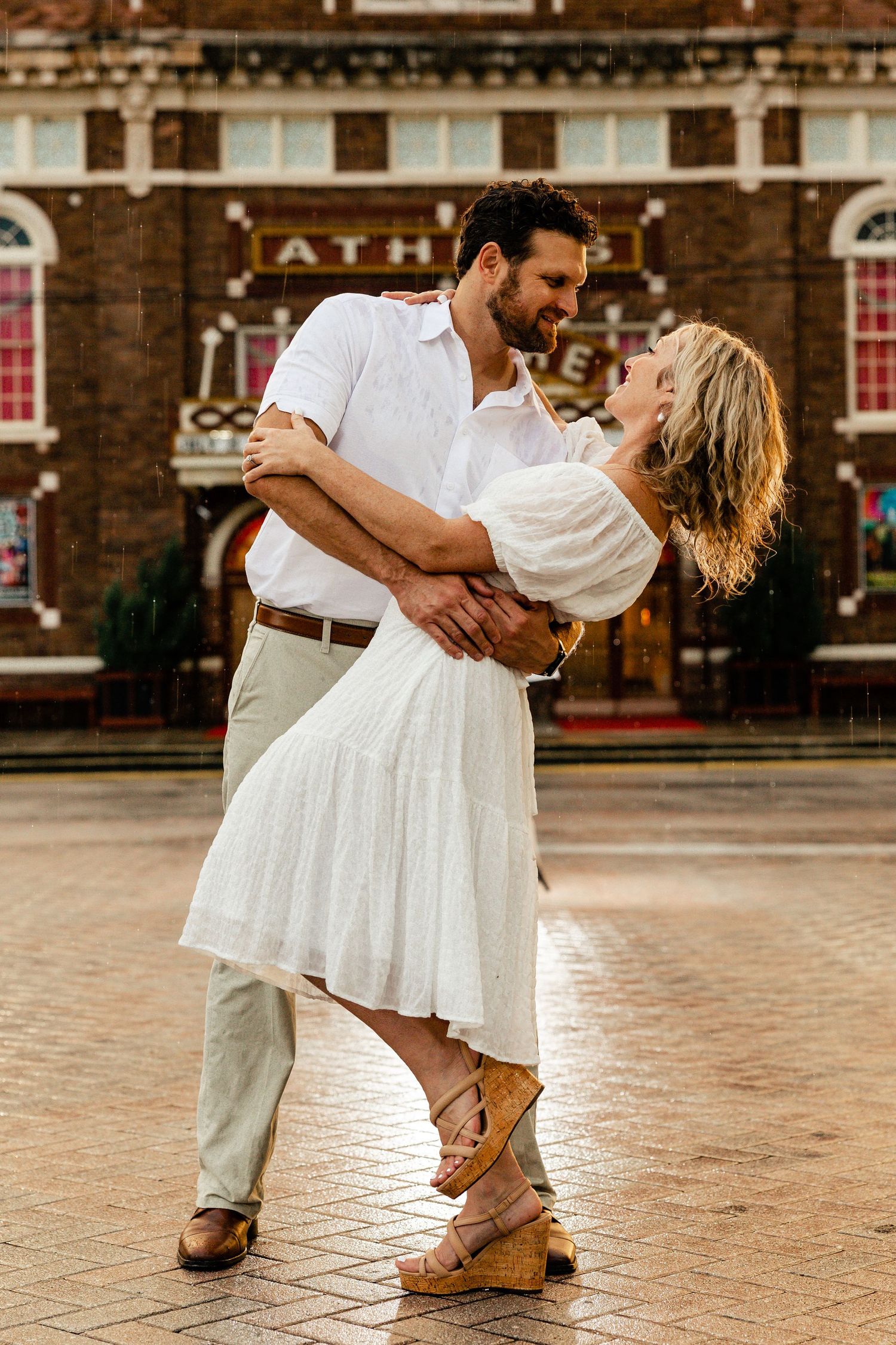 portrait of couple in front of building timeless authentic photograph taken by photographer in orlando