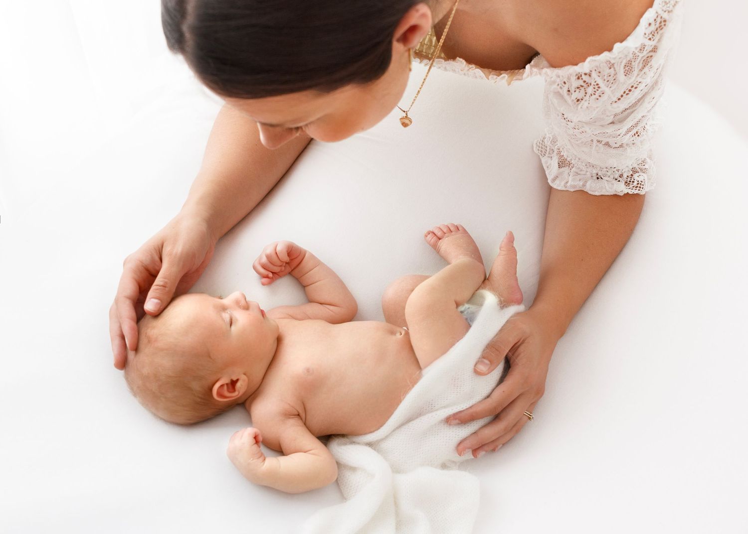 Mama gazing at baby in photo studio Victoria BC