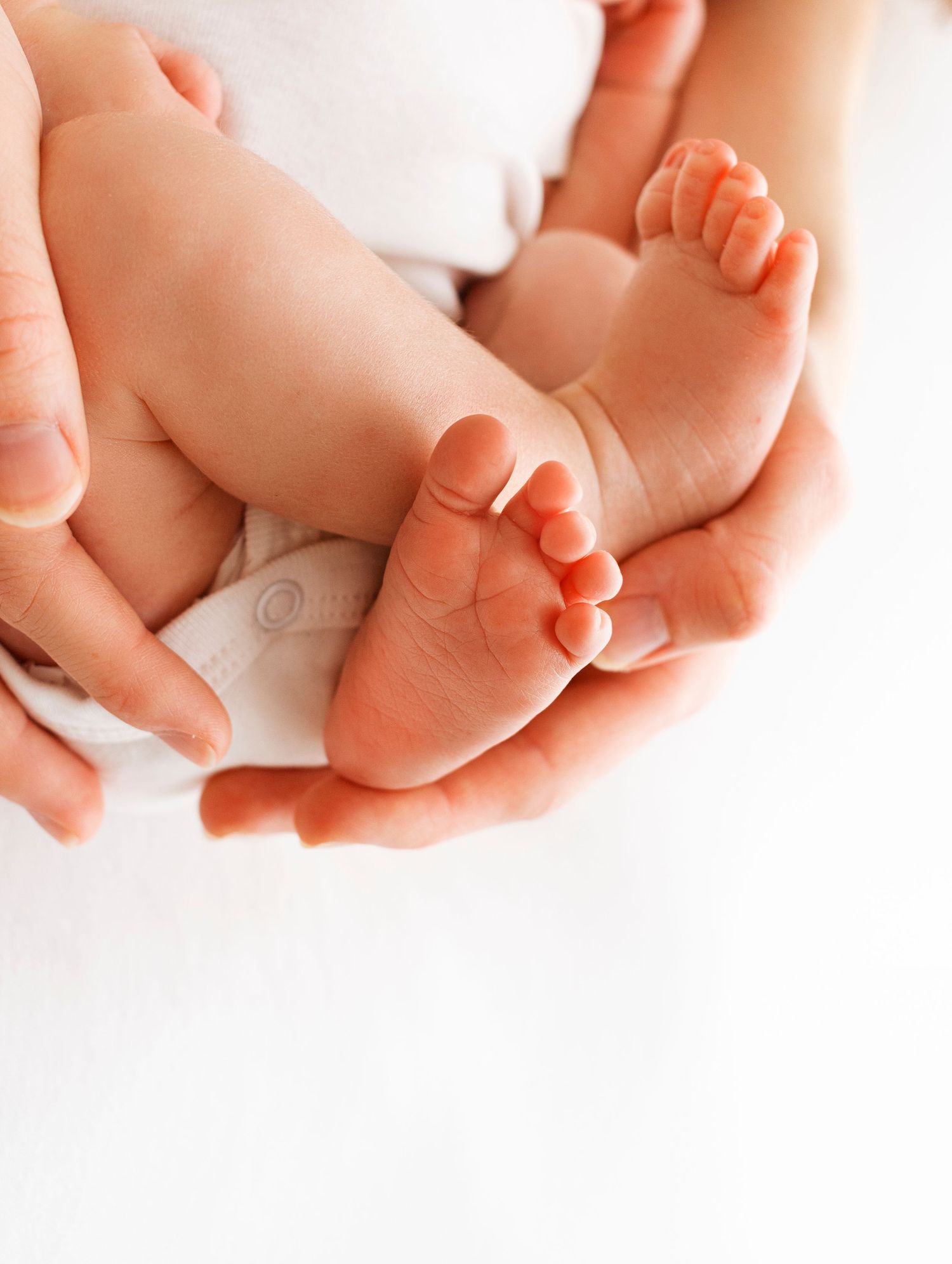 Cute baby toes in timeless white photography style