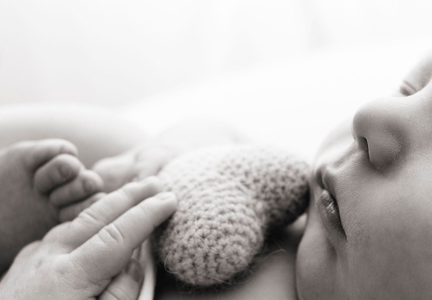 Natural newborn photography: close details of baby sleeping
