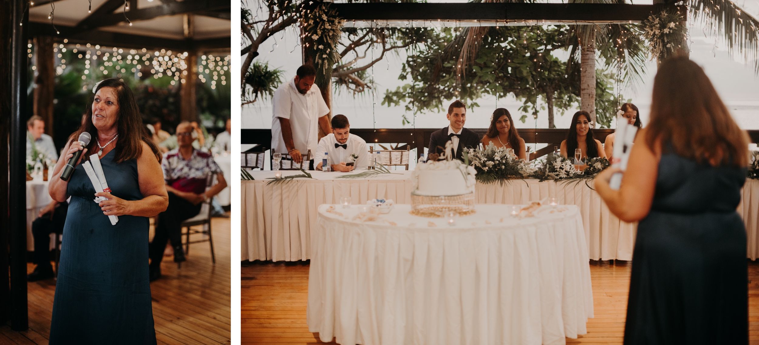 Wedding reception setup with white-clothed tables and guests mingling in a rustic outdoor venue.
